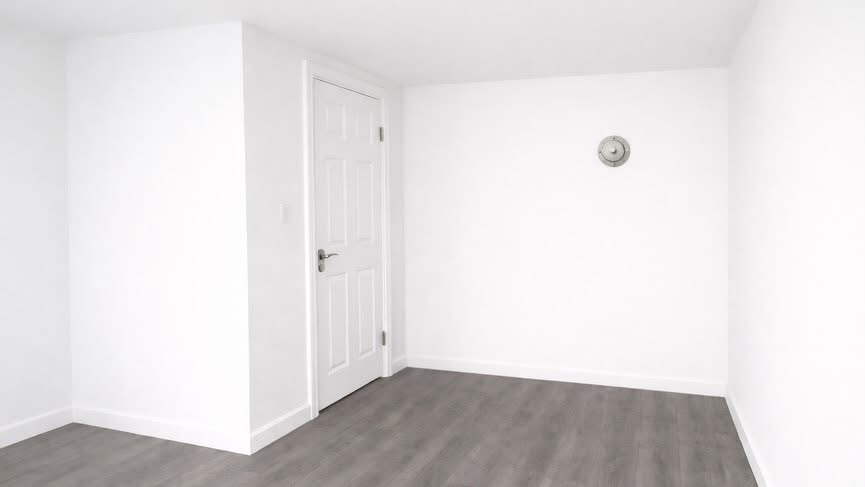 Discreet saferoom door integrated into a modern room